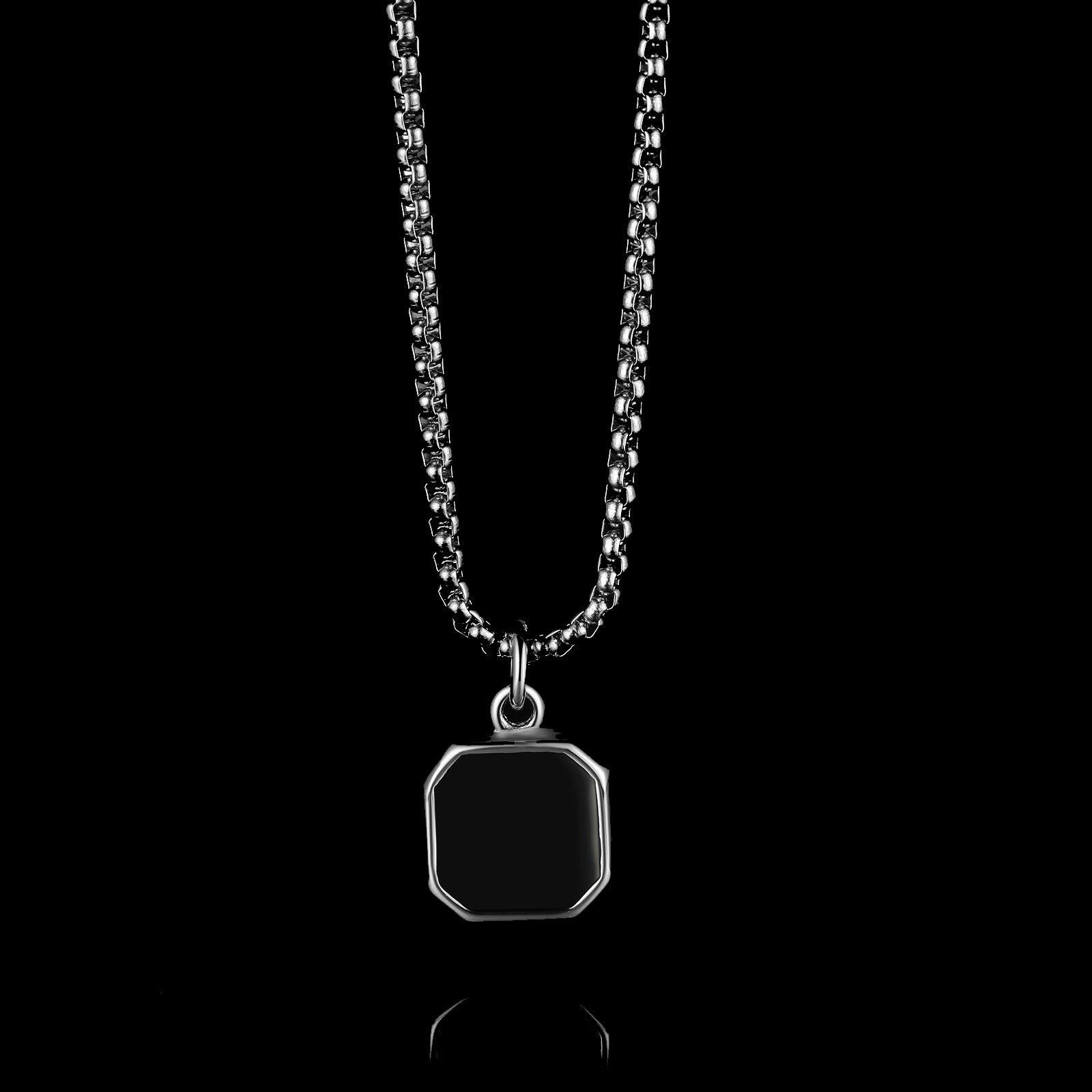 THE ONYX BADGE. - NECKLACE